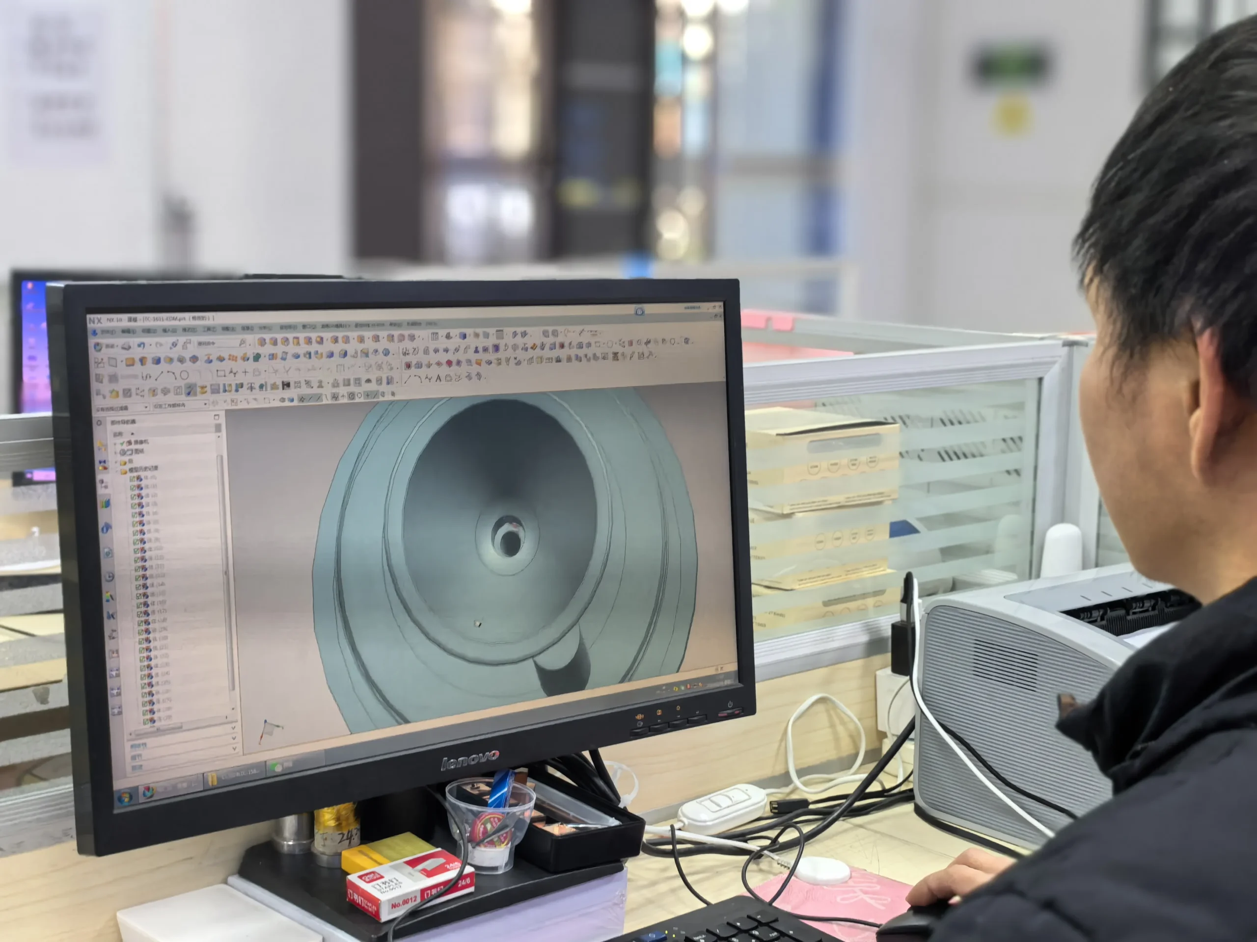 Mechanical engineer working on 3D CAD design for product development and mold engineering